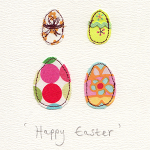 four  stitched fabric eggs handmade card