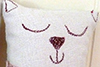 close up of handmade linen cat 2's sleepy face