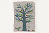 large framed textile picture of a tree with a baby bird waiting to jump out with its mother on the ground