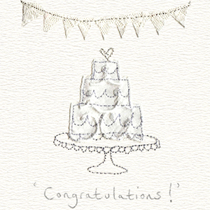 white bunting wedding cake on stand handmade card