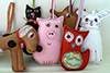 a collection of handmade animal decorations